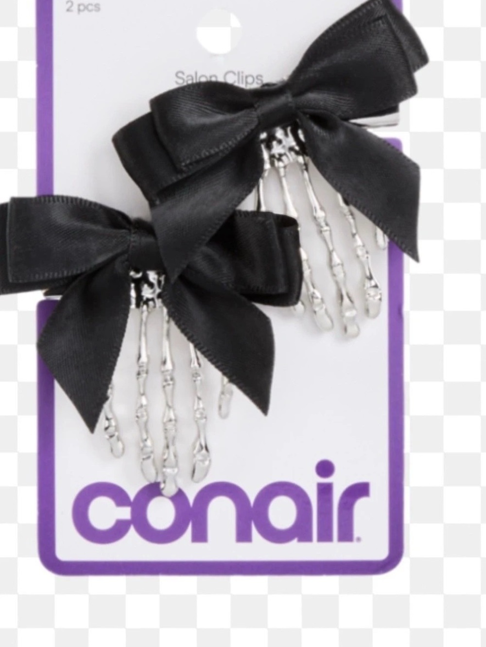 Conair Halloween Skeleton Hand Salon Clips silver with black bows.